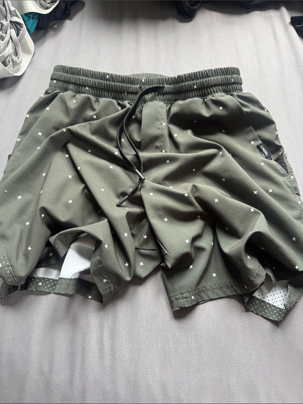 Men's UNRL Olive Athletic Shorts with Subtle White Cross Print